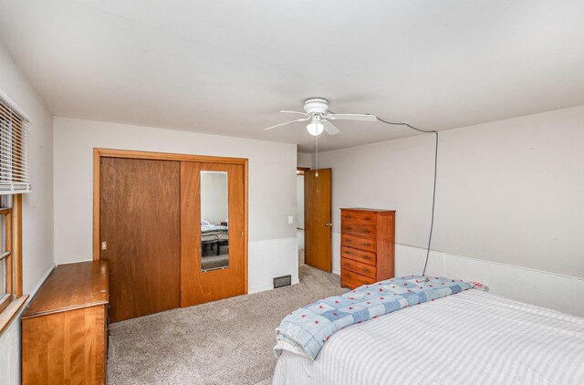 5870 Lynwood Blvd, Mound, MN 55364 - bedroom featuring carpet floors, a closet, and a ceiling fan