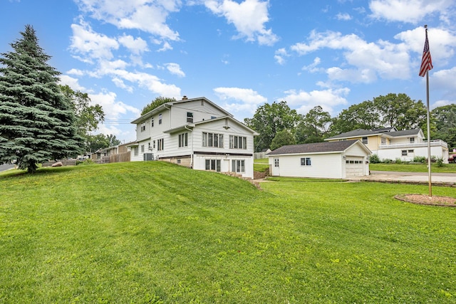 5870 Lynwood Blvd, Mound, MN 55364 - back of property featuring a lawn and driveway