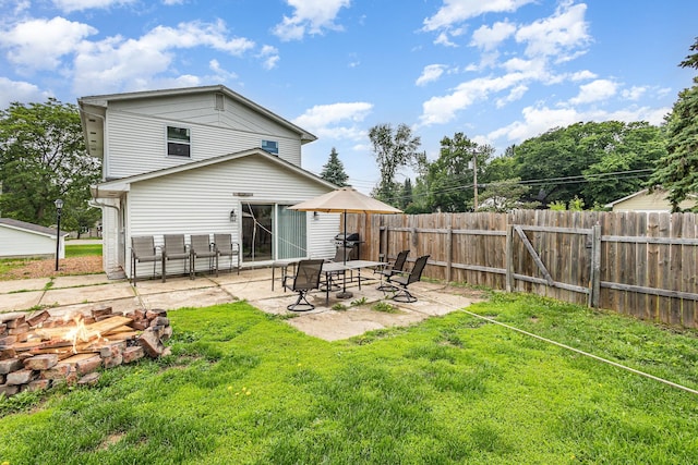 5870 Lynwood Blvd, Mound, MN 55364 - back of property featuring an outdoor fire pit and a patio