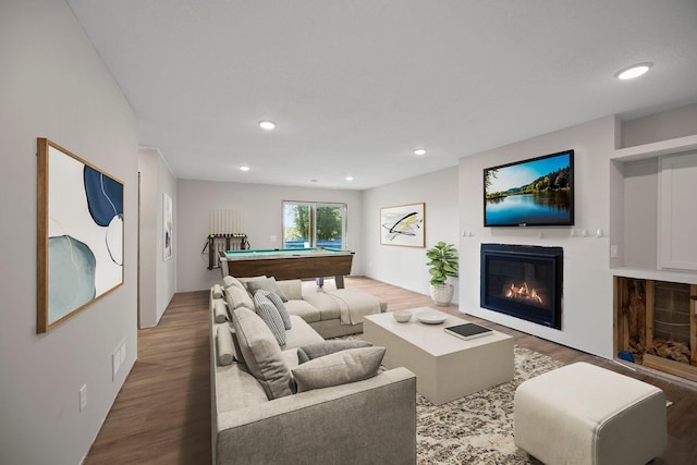426 Dillon Ave N, Montrose, MN 55363 - living area with wood finished floors, billiards table, a glass covered fireplace, and recessed lighting