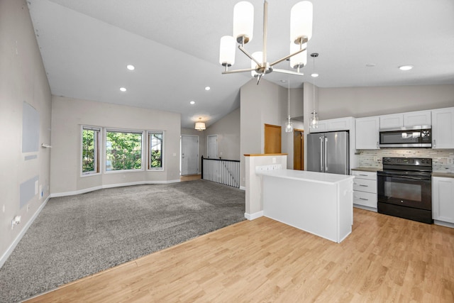 426 Dillon Ave N, Montrose, MN 55363 - kitchen featuring stainless steel appliances, white cabinets, a chandelier, baseboards, and recessed lighting