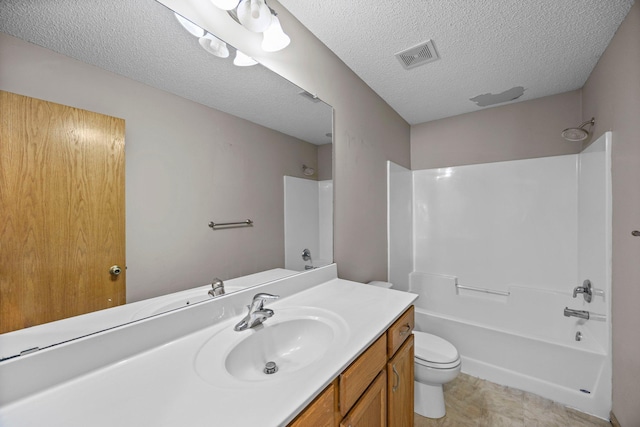 426 Dillon Ave N, Montrose, MN 55363 - bathroom featuring toilet, bathing tub / shower combination, vanity, and a textured ceiling