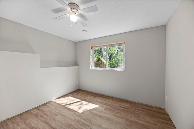 426 Dillon Ave N, Montrose, MN 55363 - unfurnished room featuring wood finished floors and a ceiling fan