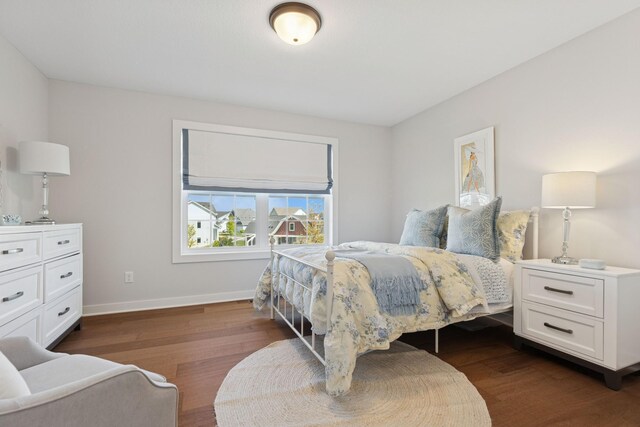 10859 23rd St NE, Saint Michael, MN 55376 - bedroom with dark wood-style flooring and baseboards