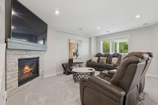 10859 23rd St NE, Saint Michael, MN 55376 - carpeted living room with a stone fireplace, baseboards, and recessed lighting