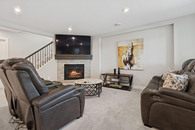 10859 23rd St NE, Saint Michael, MN 55376 - carpeted living area featuring a fireplace, recessed lighting, stairs, and baseboards