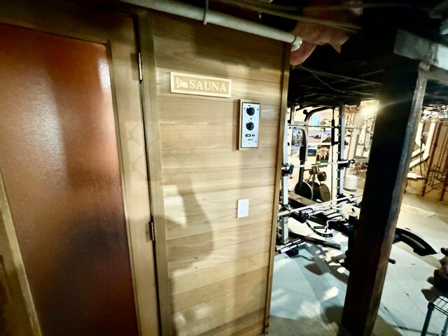 interior space featuring wooden walls