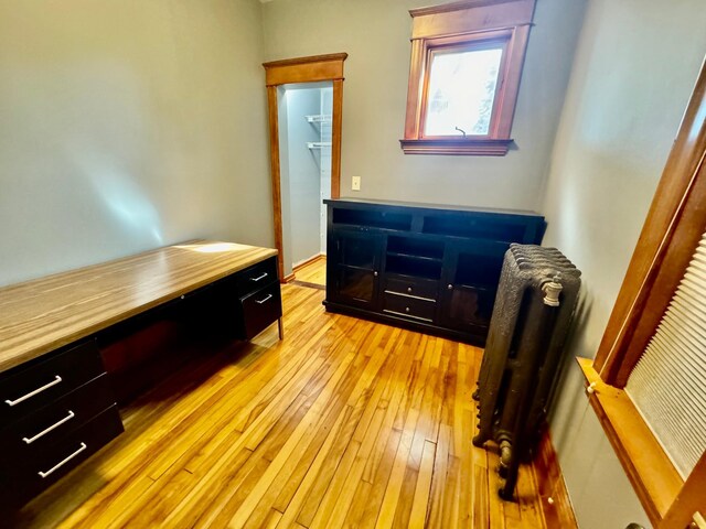 home office featuring light wood-style flooring