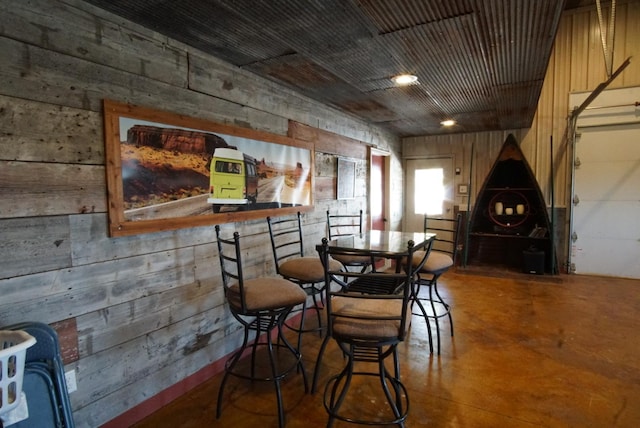dining area featuring concrete floors