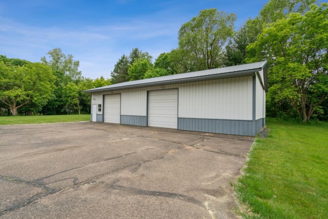 11170 207th Ave NW, Elk River, MN 55330 - detached garage with view of wooded area