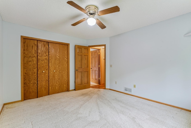 11170 207th Ave NW, Elk River, MN 55330 - unfurnished bedroom with a closet, carpet flooring, and a ceiling fan