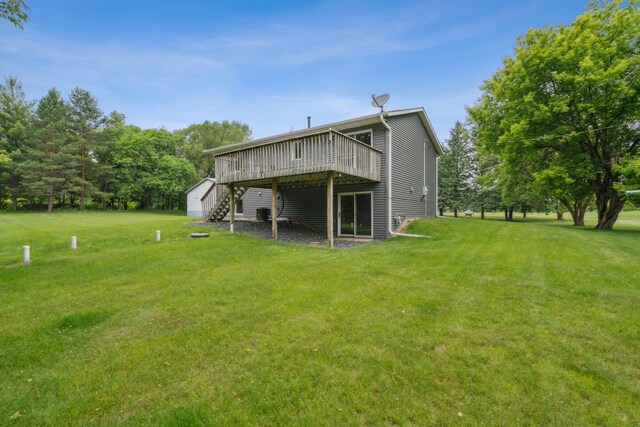 11170 207th Ave NW, Elk River, MN 55330 - back of property featuring a wooden deck, a yard, and stairway