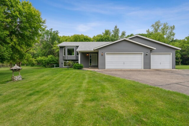 11170 207th Ave NW, Elk River, MN 55330 - split level home featuring a front lawn, a garage, and a shingled roof