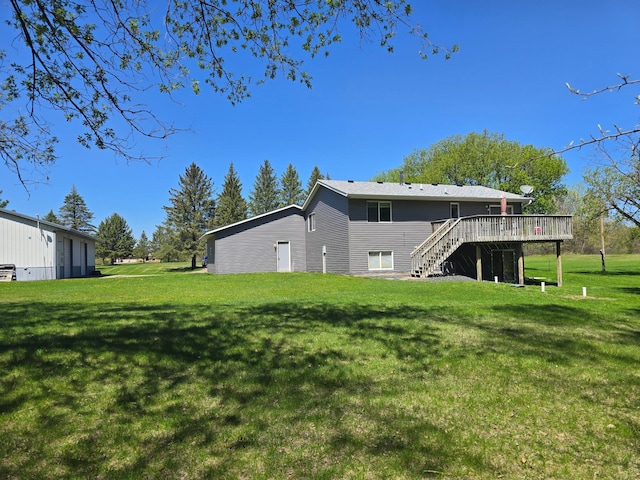 11170 207th Ave NW, Elk River, MN 55330 - rear view of house featuring a deck, stairs, and a yard