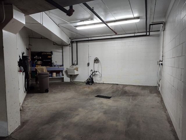 interior space with concrete block wall