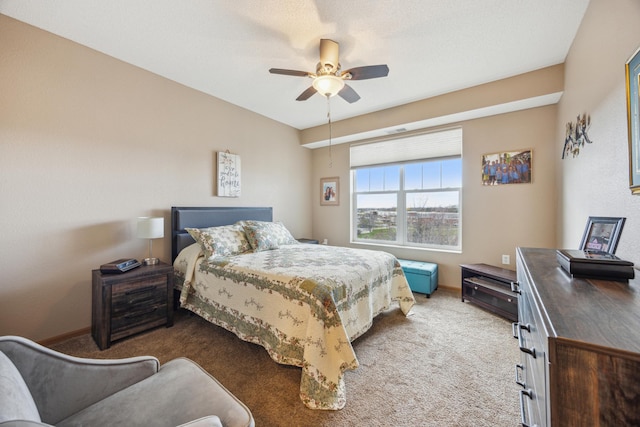 bedroom with baseboards, ceiling fan, and carpet flooring