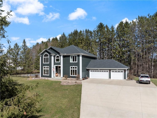 view of front of house featuring a front yard, driveway, an attached garage, and roof with shingles