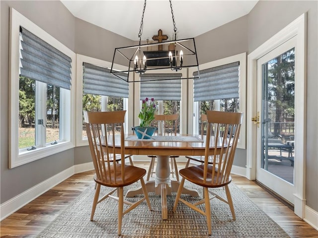 interior space with a chandelier and french doors