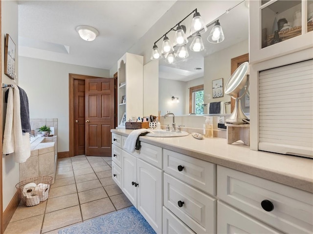 full bathroom featuring vanity and tile patterned floors