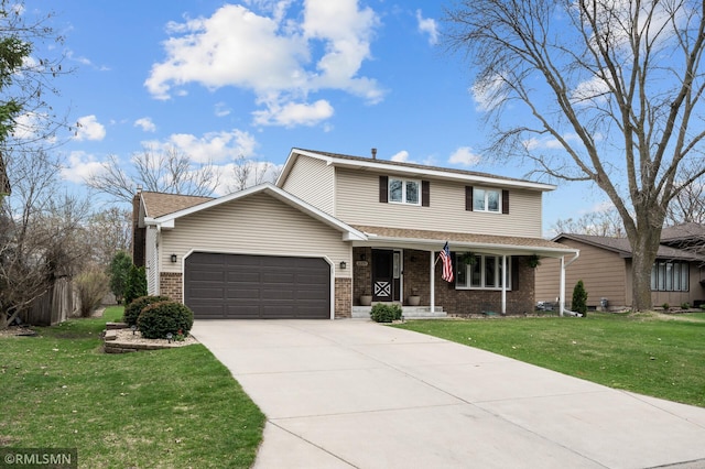 view of front of home featuring a front lawn, an attached garage, a porch, and brick siding
