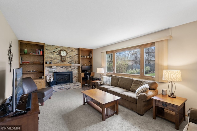 living room featuring carpet floors and a fireplace