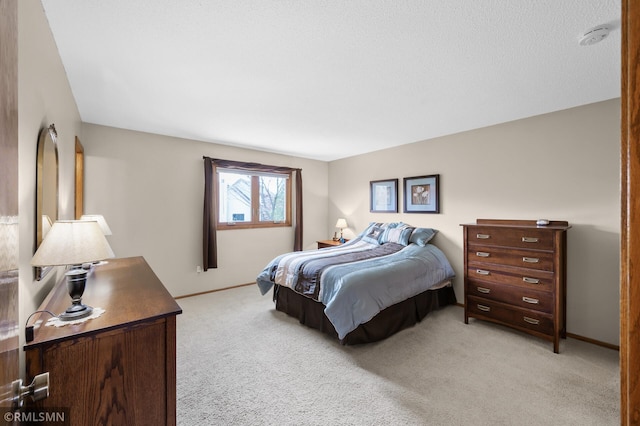 bedroom with light carpet