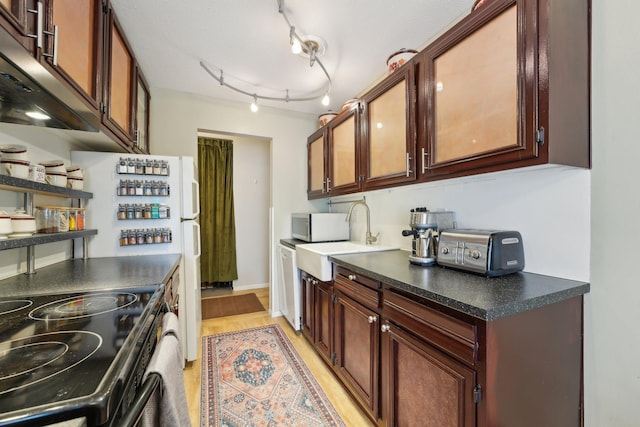 4654 Cedar Lake Rd S Unit 6, Saint Louis Park, MN 55416 - kitchen featuring white dishwasher, dark countertops, a sink, a toaster, and black range with electric cooktop