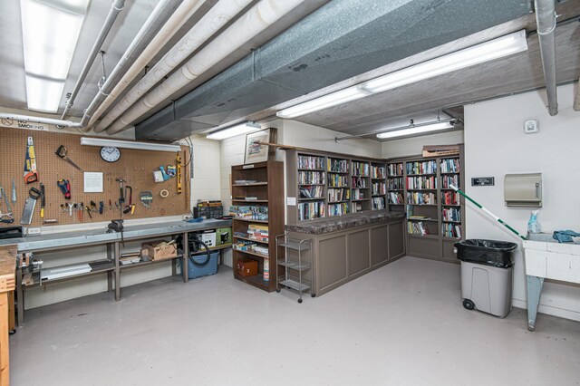 basement with a workshop area