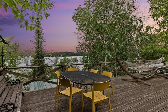 95536 Pine Is, Greenwood Twp, MN 55790 - deck featuring outdoor dining area and a water view