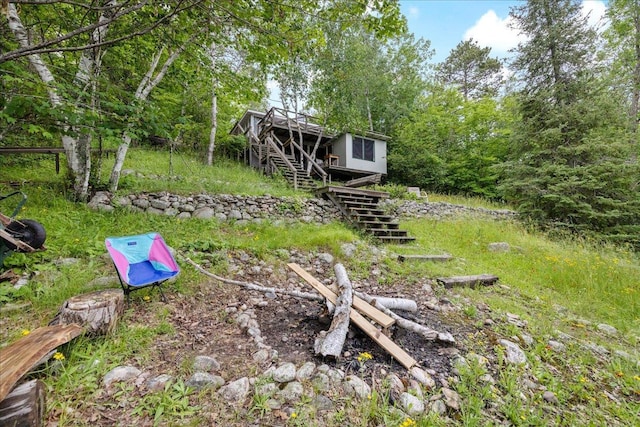 95536 Pine Is, Greenwood Twp, MN 55790 - view of yard with stairway and a wooden deck