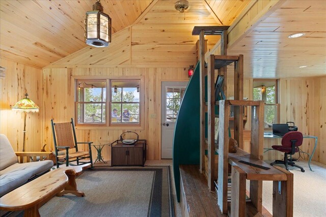 95536 Pine Is, Greenwood Twp, MN 55790 - living area featuring wooden ceiling, wooden walls, lofted ceiling, and healthy amount of natural light
