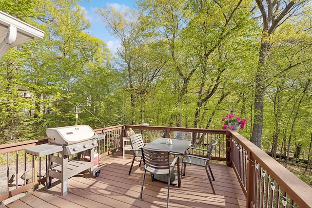 17300 Tilia Rdg, Eden Prairie, MN 55347 - wooden terrace featuring outdoor dining space and area for grilling