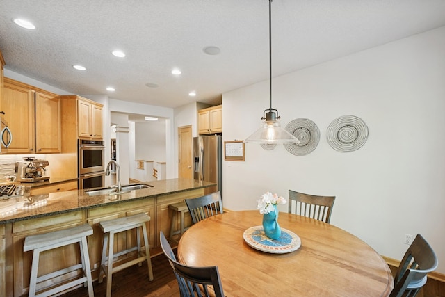 17300 Tilia Rdg, Eden Prairie, MN 55347 - dining space featuring recessed lighting and wood finished floors