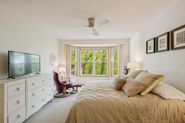 17300 Tilia Rdg, Eden Prairie, MN 55347 - bedroom with carpet flooring, a textured ceiling, and a ceiling fan