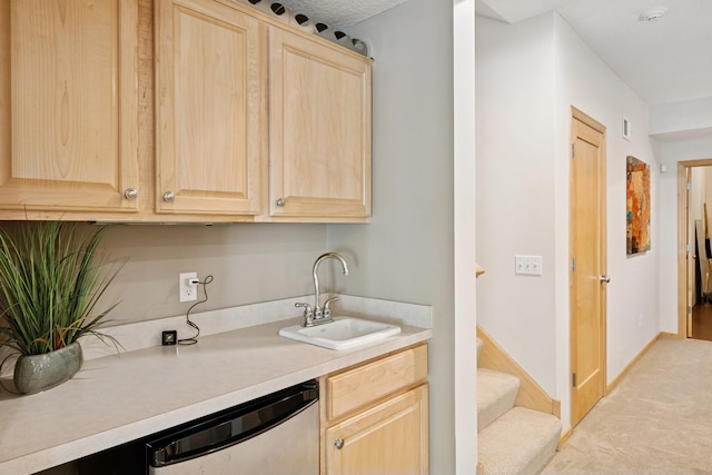 17300 Tilia Rdg, Eden Prairie, MN 55347 - kitchen with light brown cabinetry, dishwasher, a sink, and light countertops