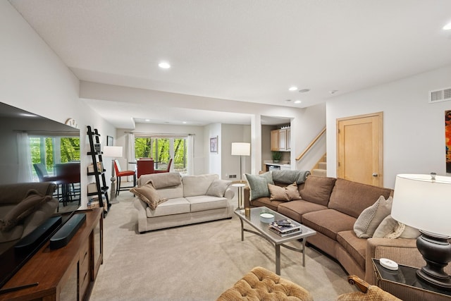 17300 Tilia Rdg, Eden Prairie, MN 55347 - living area with recessed lighting, light colored carpet, and stairs