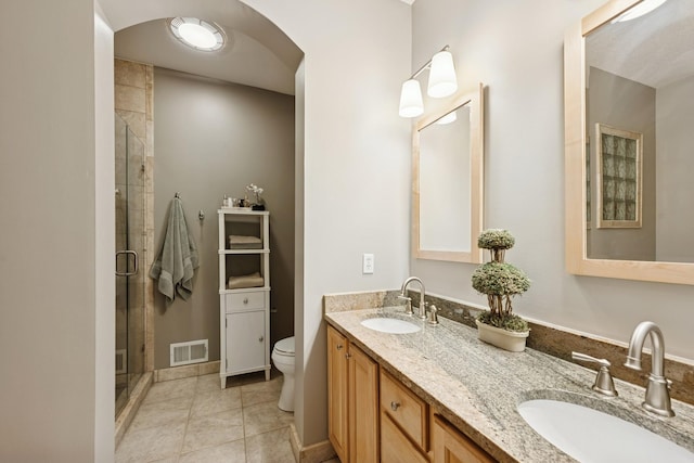 17300 Tilia Rdg, Eden Prairie, MN 55347 - full bathroom with a stall shower, double vanity, and tile patterned floors