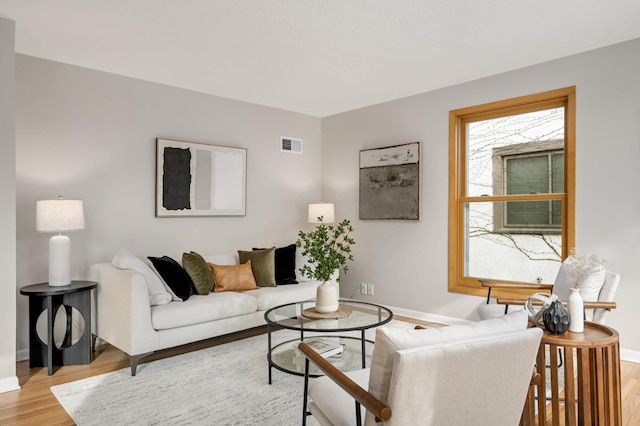 4836 Bloomington Ave, Minneapolis, MN 55417 - living area featuring light wood finished floors and baseboards