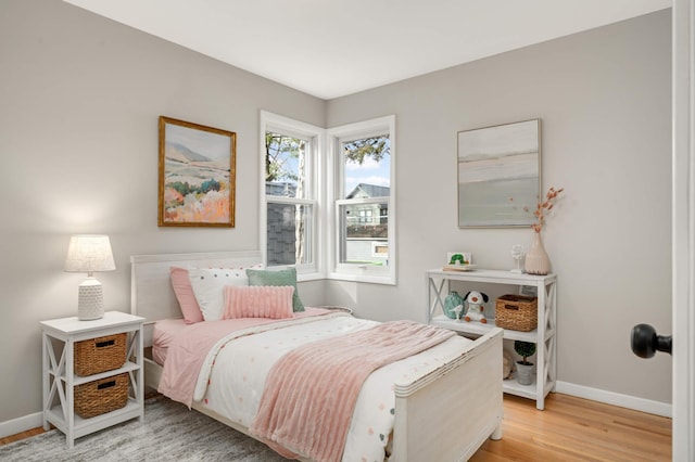 4836 Bloomington Ave, Minneapolis, MN 55417 - bedroom featuring light wood-style flooring and baseboards