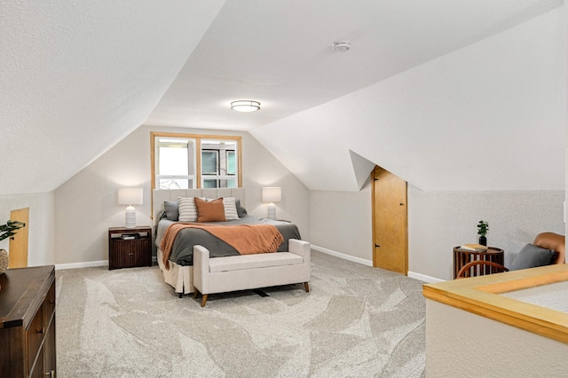4836 Bloomington Ave, Minneapolis, MN 55417 - bedroom with light colored carpet, baseboards, and vaulted ceiling