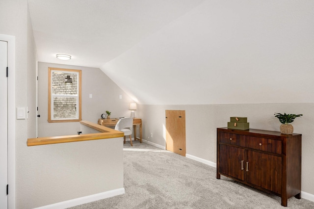 4836 Bloomington Ave, Minneapolis, MN 55417 - additional living space with vaulted ceiling, light carpet, and baseboards