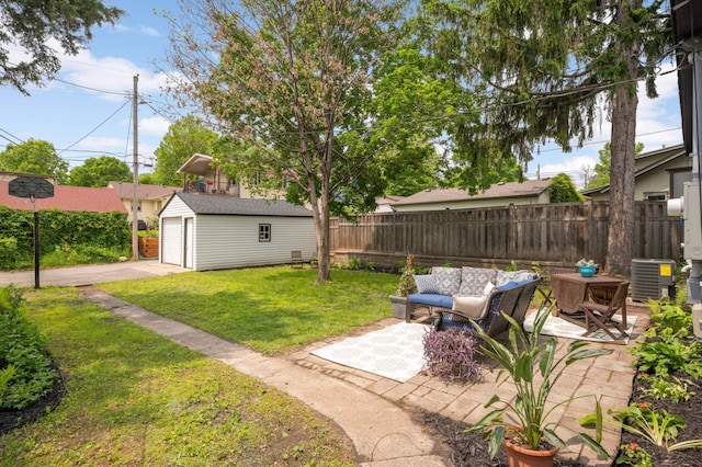 4836 Bloomington Ave, Minneapolis, MN 55417 - view of yard with central air condition unit, an outbuilding, outdoor lounge area, a patio, and a garage