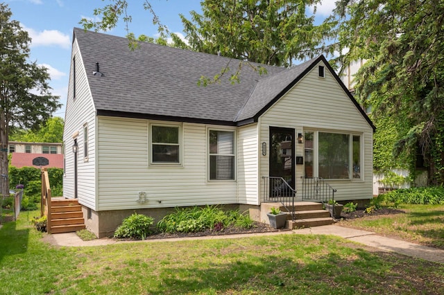 4836 Bloomington Ave, Minneapolis, MN 55417 - view of front of property with a shingled roof and a front yard