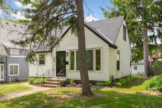 4836 Bloomington Ave, Minneapolis, MN 55417 - view of front of house with roof with shingles and a front yard