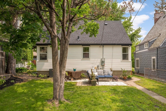 4836 Bloomington Ave, Minneapolis, MN 55417 - back of house with an outdoor living space, a shingled roof, and a patio area