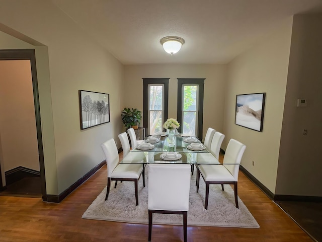2108 Elliot Ave, Minneapolis, MN 55404 - dining space with baseboards and wood finished floors