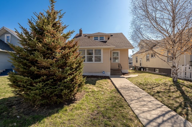 1634 Upton Ave N, Minneapolis, MN 55411 - bungalow-style home with a chimney and a shingled roof