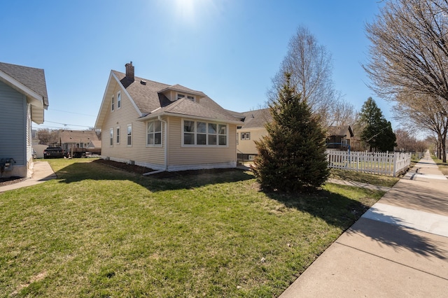 1634 Upton Ave N, Minneapolis, MN 55411 - view of side of property featuring a chimney and roof with shingles