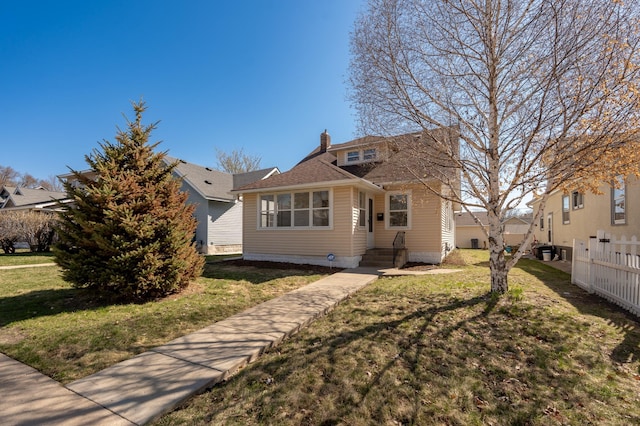1634 Upton Ave N, Minneapolis, MN 55411 - bungalow-style house featuring a chimney