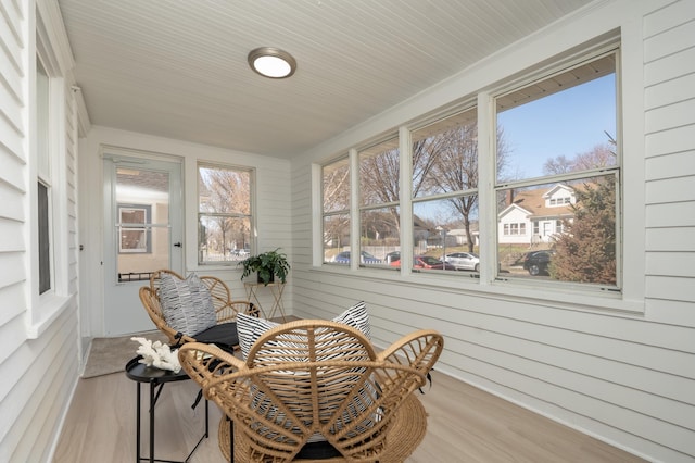 1634 Upton Ave N, Minneapolis, MN 55411 - sunroom with wood finished floors